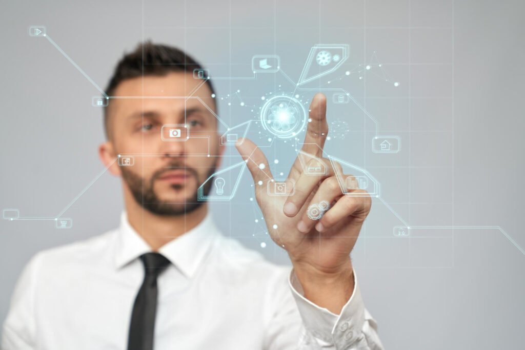 Businessman interacting with floating digital user interface and technology icons.